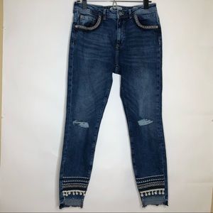 MAVI JEANS CO Tess High-rise skinny jean distressed and dingle ball trim…